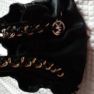 Black soft leather Michael kors collection hand bag